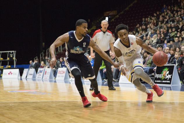 Halifax Hurricanes PG Cliff Clinkscales defends against the St. John's Edge