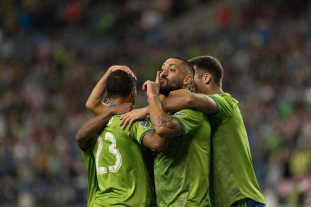 Seattle Sounders FC celebrate Clint Dempsey's goal