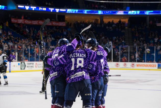 Adam Pleskach and the Tulsa Oilers celebrate a goal