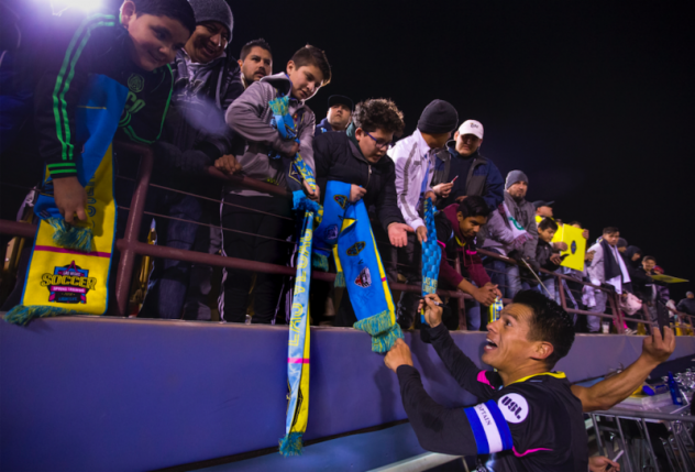 Las Vegas Lights FC defender and captain Marcelo Alatorre signs for the fans