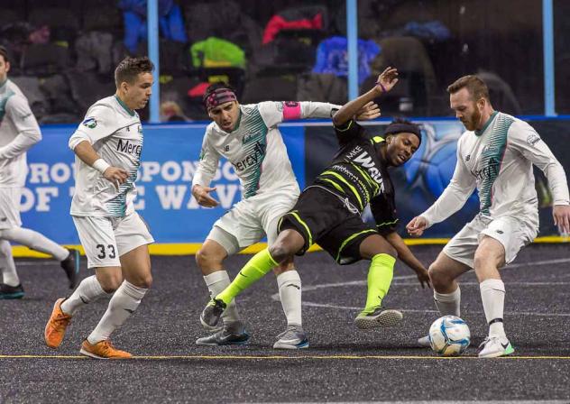 Milwaukee Wave Midfielder Ian Bennett battles for the ball