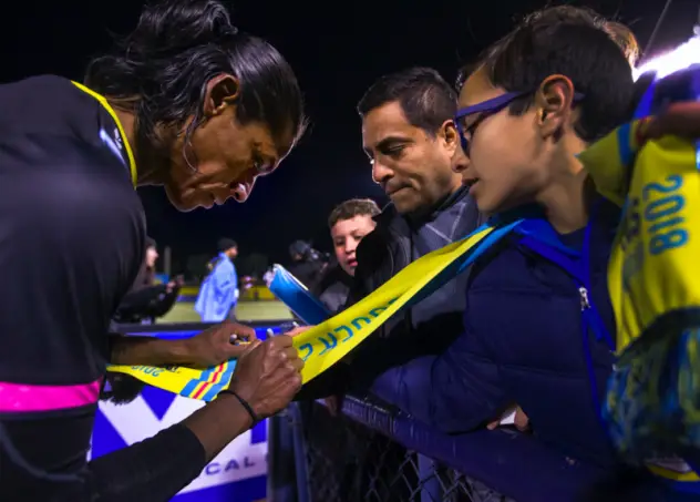Las Vegas Lights FC player signs for the fans