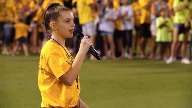 Marissa Peddie sings the national anthem at a Tampa Bay Rowdies game