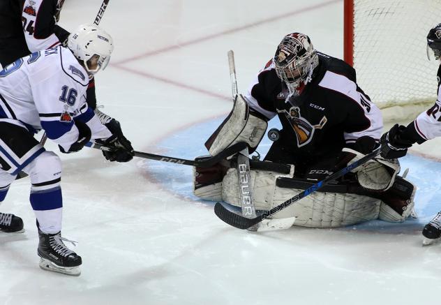 Vancouver Giants Goaltender Trent Miner smothers a Victoria Royals' shot