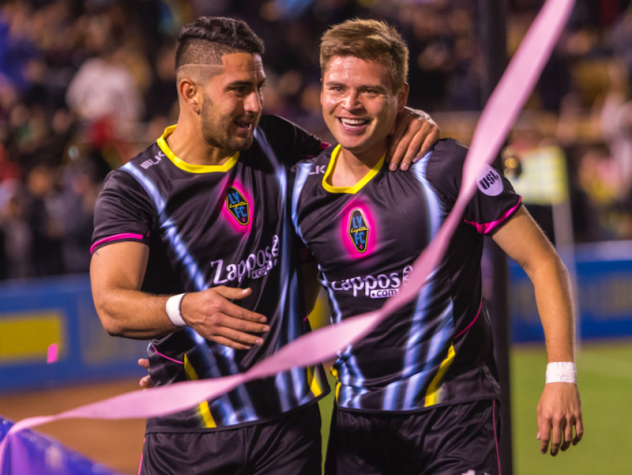 Las Vegas Lights FC Defender Marco Cesar Jaime Jr. (left) congratulates Midfielder Alex Mendoza