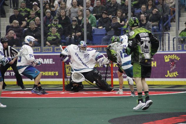 Rochester Knighthawks Goalkeeper Matt Vinc stops the Saskatchewan Rush