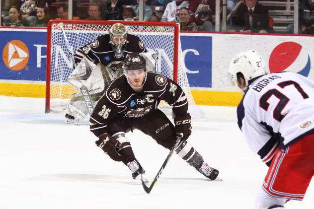 Hershey Bears Right Wing Garrett Mitchell faces the Rochester Americans