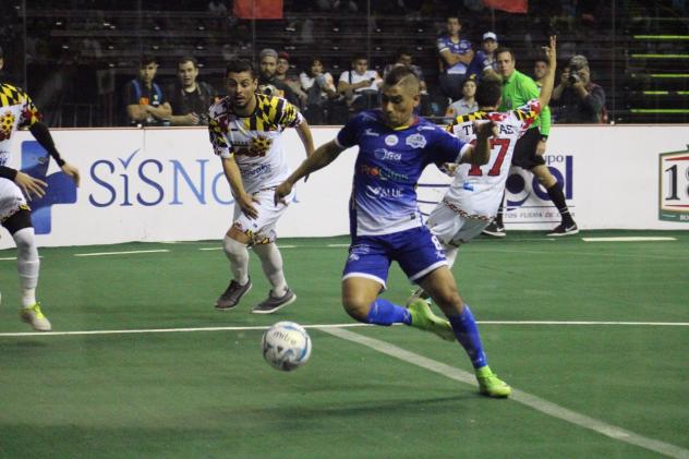 Miguel Angel Vaca tries to navigate past the Baltimore Blast defense