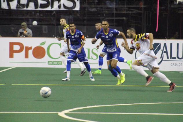 Baltimore Blast and Monterrey Flash race to the ball