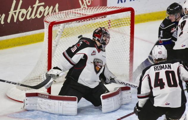 Vancouver Giants Goaltender David Tendeck holds off the Victoria Royals's charge