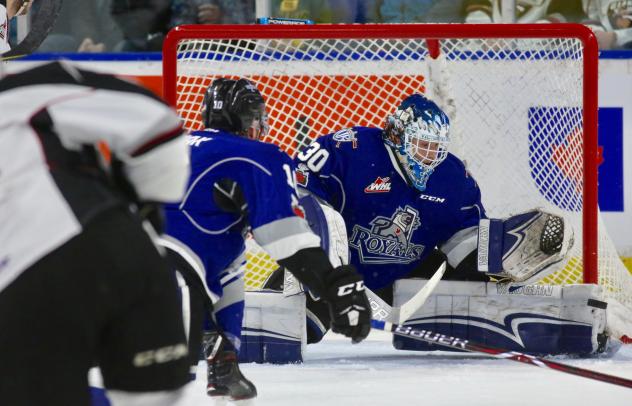Victoria Royals Goaltender Griffen Outhouse makes a stop against the Vancouver Giants