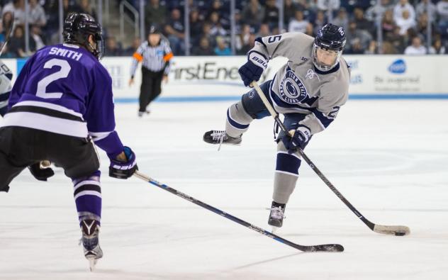 Defenseman Larry Smith with Penn State