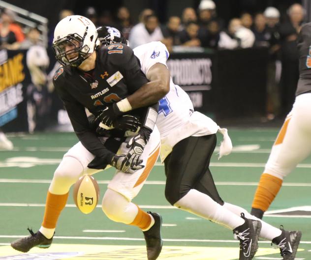 Arizona Rattlers Quarterback Jeff Ziemba fumbles against the Cedar Rapids Titans