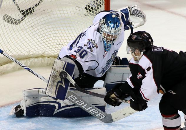 Ty Ronning of the Vancouver Giants gets a shot by Victoria Royals Goaltender Griffen Outhouse