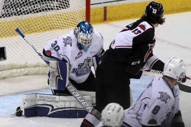 Tyler Popowich of the Vancouver Giants shoots vs. Victoria Royals Goaltender Griffen Outhouse