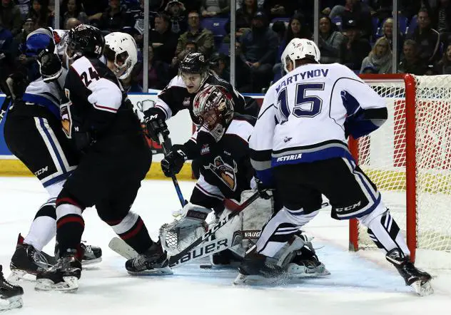 Vancouver Giants Goaltender David Tendeck smothers a Victoria Royals scoring attempt