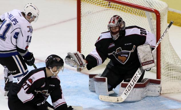 Vancouver Giants Goaltender David Tendeck with a glove save on a Victoria Royals' shot
