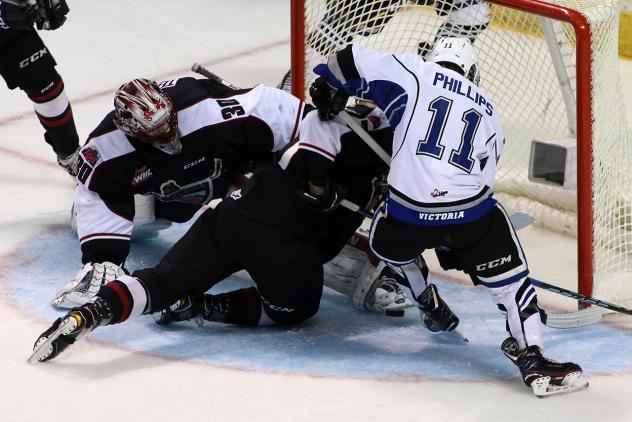 Goaltender David Tendeck and the Vancouver Giants try to keep the Victoria Royals from scoring
