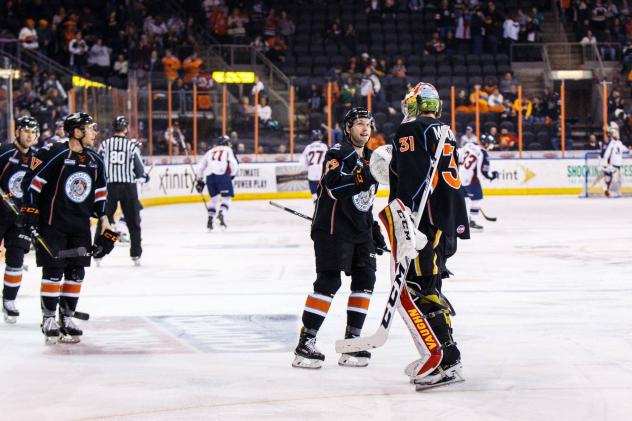 Kansas City Mavericks celebrate their win over the Tulsa Oilers