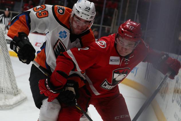 Lehigh Valley Phantoms Defenseman David Drake fights through the Charlotte Checkers