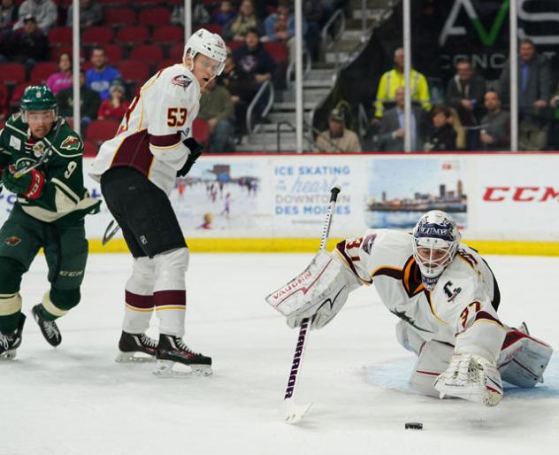 Cleveland Monsters Goaltender Jeff Zatkoff eyes a loose puck vs. the Iowa Wild