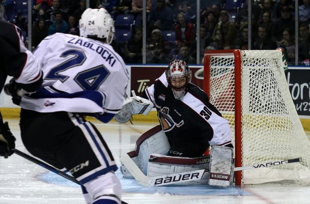 Vancouver Giants Goaltender David Tendeck stops a Victoria Royals's shot