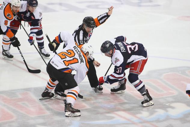 Lehigh Valley Phantoms Forward Mike Vecchione faces off against the Hartford Wolf Pack
