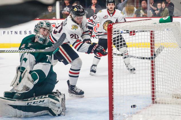 Joachim Blichfeld of the Portland Winterhawks scores against Everett Silvertips Goaltender Carter Hart