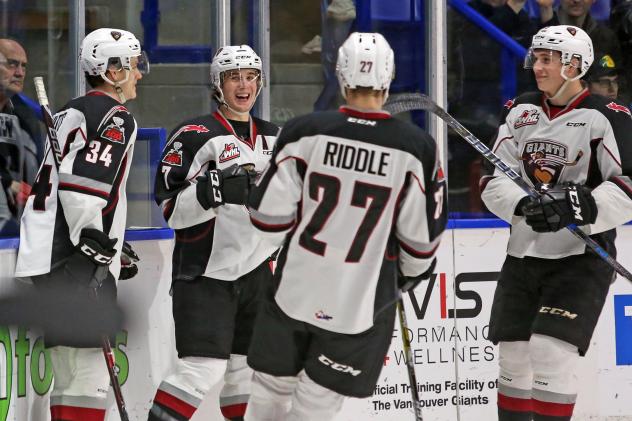 Vancouver Giants Forward Ty Ronning shares a laugh with his teammates