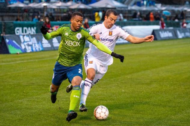 Jody Delem of Seattle Sounders FC 2 jockeys for position against Real Monarchs SLC