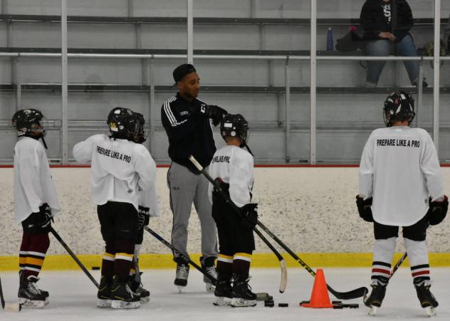 Scooter Vaughan of the Chicago Wolves instructs at Kids For Camps