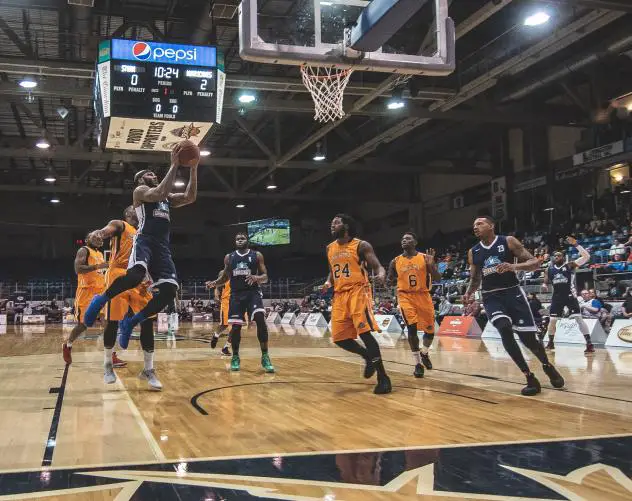 Halifax Hurricanes drive to the basket against the Island Storm
