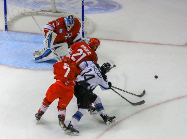 Brady Brassart of the Idaho Steelheads battles the Allen Americans