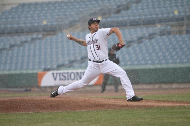 Syracuse Chiefs Pitcher Cesar Vargas throws in the snow