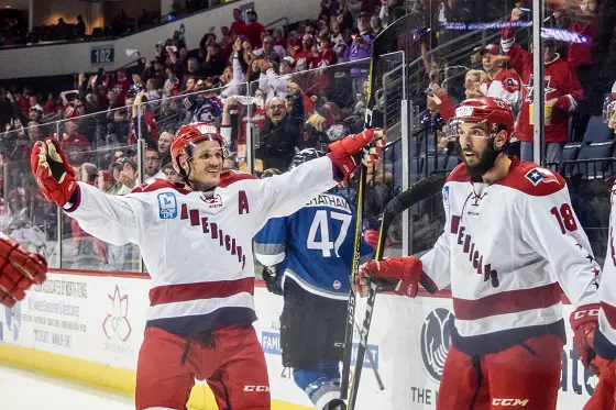 David Makowski and Zach Pochiro celebrate an Allen Americans' goal