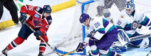 South Carolina Stingrays forward Dylan Margonari tries to score on Orlando Solar Bears goaltender Cal Heeter