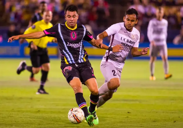 Las Vegas Lights FC's Carlos Alvarez works for possession against Sacramento Republic FC