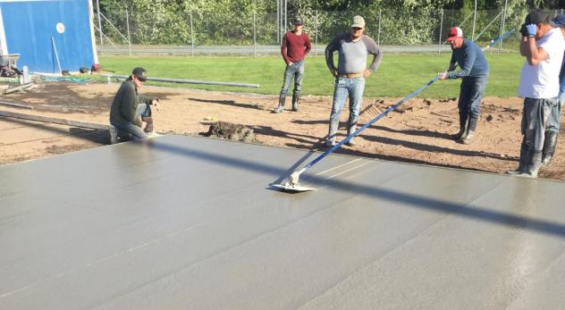 Concrete being leveled at Borleske Stadium