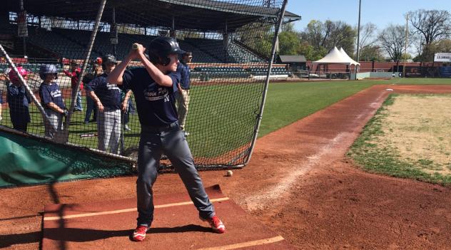 Fan batting practice at Evansville Otters Fan Fest