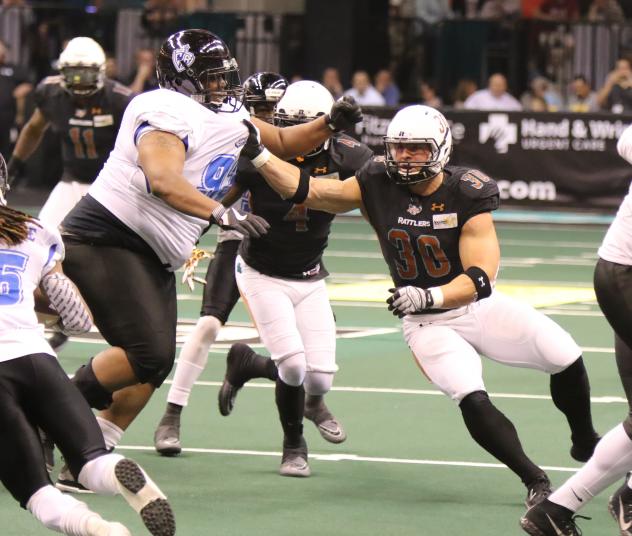 Justin Shirk of the Arizona Rattlers zeros in on a Cedar Rapids Titans ballcarrier