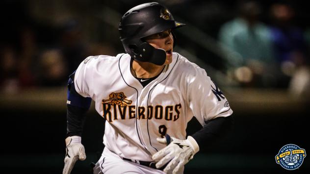 Dalton Blaser of the Charleston RiverDogs watches his home run leave the park