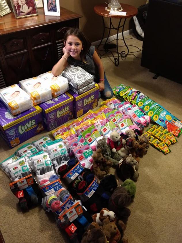Olivia Velez with donated supplies