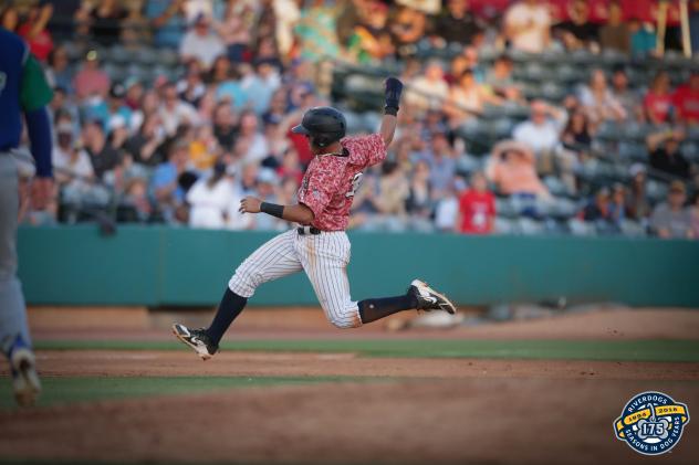 Charleston RiverDogs shortstop Wilkerman Garcia runs to first