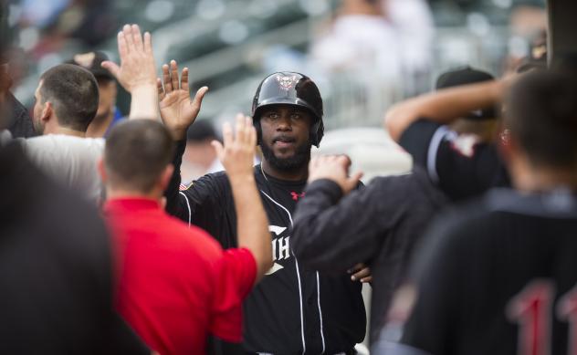 El Paso Chihuahuas outfielder Franmil Reyes exchanges high fives