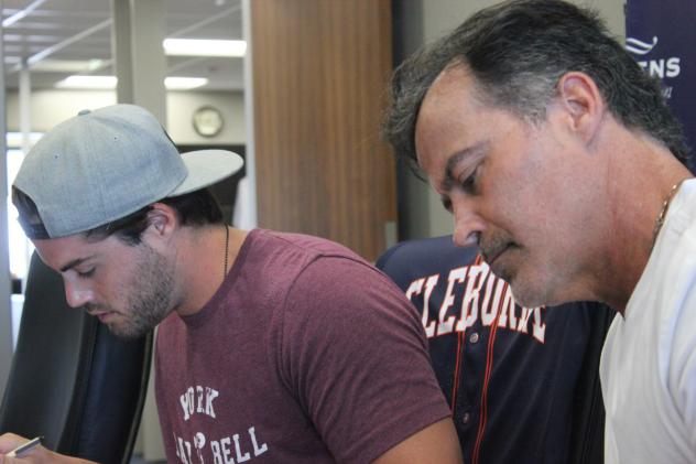 Rafael and Patrick Palmeiro signing with the Cleburne Railroaders