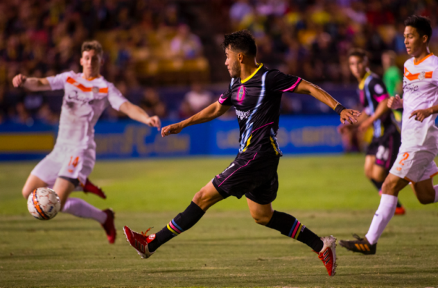 Las Vegas Lights FC's Carlos Alvarez heads upfield