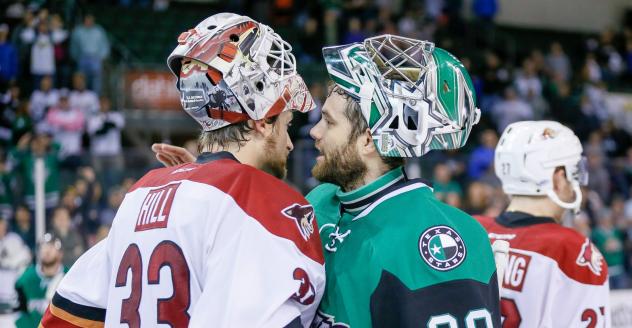 Goaltenders Adin Hill of the Tucson Roadrunners and Mike McKenna of the Texas Stars