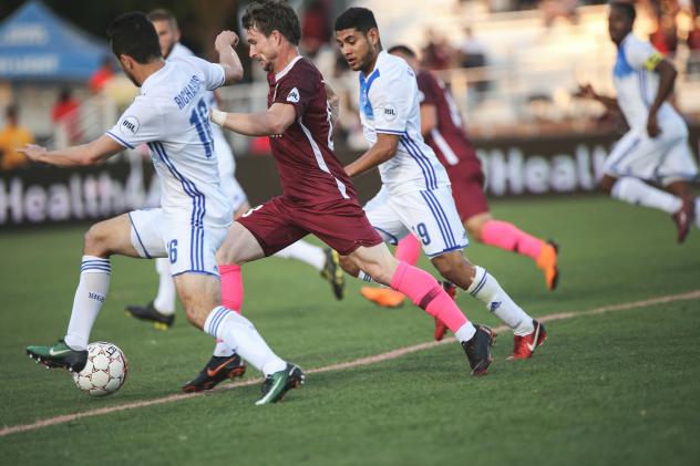 Sacramento Republic FC battles for possession with Reno 1868 FC