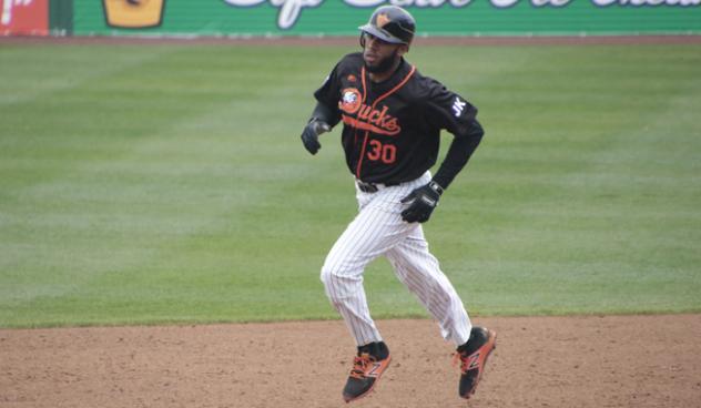 David Washington of the Long Island Ducks rounds the bases