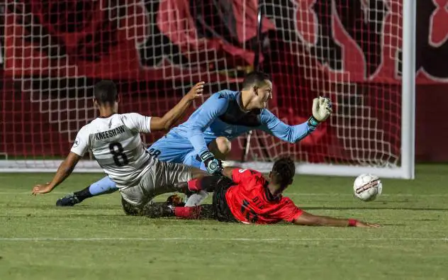 Sacramento Republic and Phoenix Rising FC pileup in front of the net